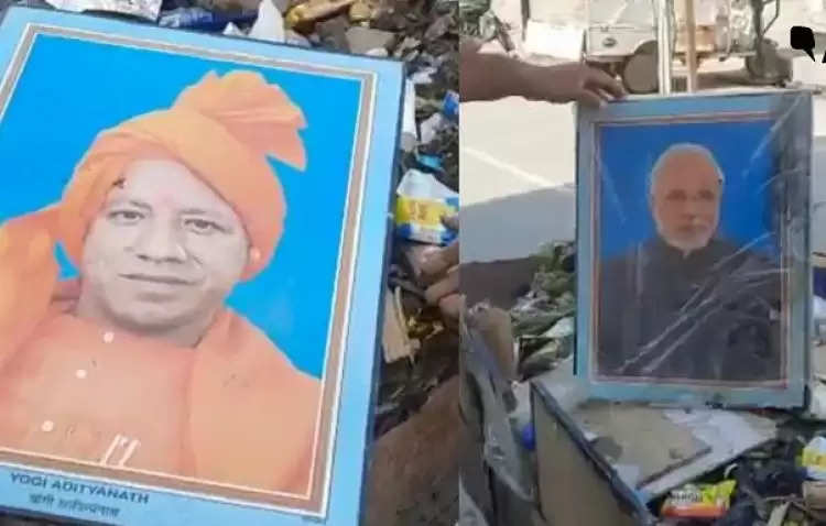 कूड़ा गाड़ी में PM मोदी और CM योगी की तस्वीरें ले जा रहा सफाईकर्मी, वीडियो वायरल होने पर बर्खास्त